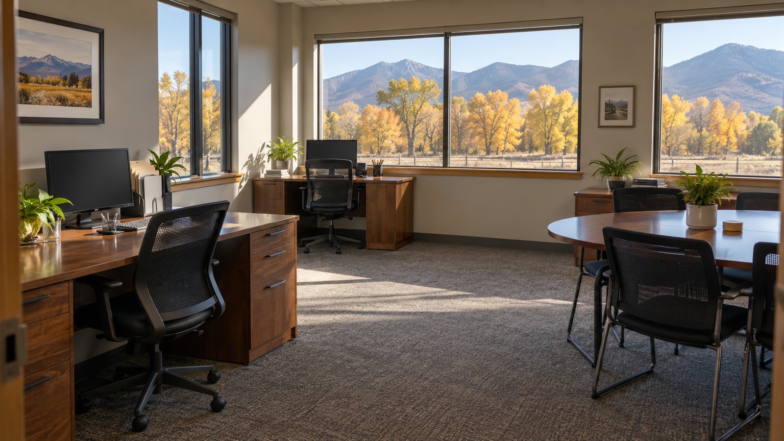 Tidy office with autumn trees outside